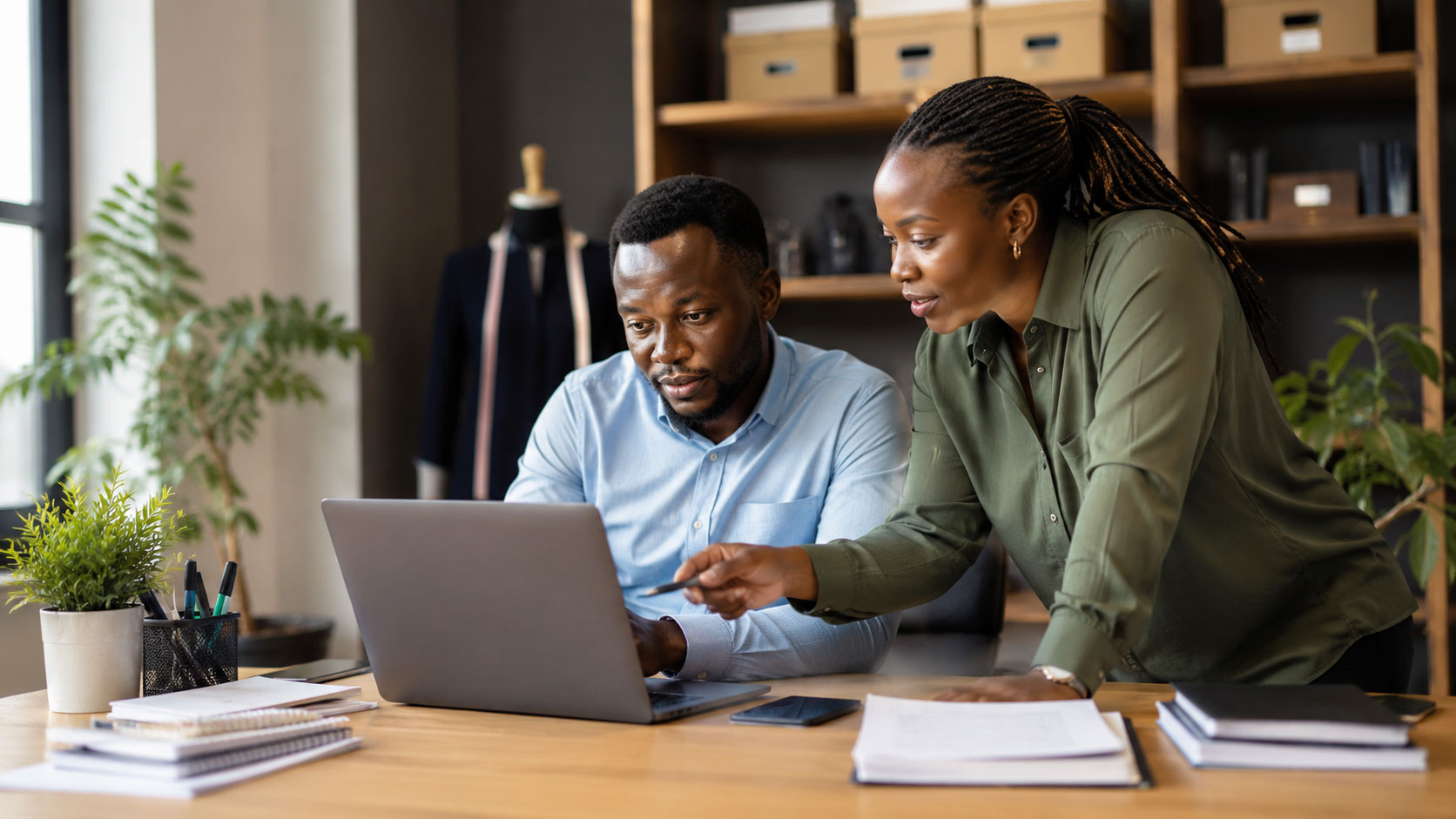Business owner assigning staff permissions and access controls